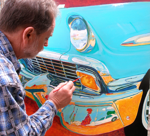 Jack painting a blue Chevrolet, in progress